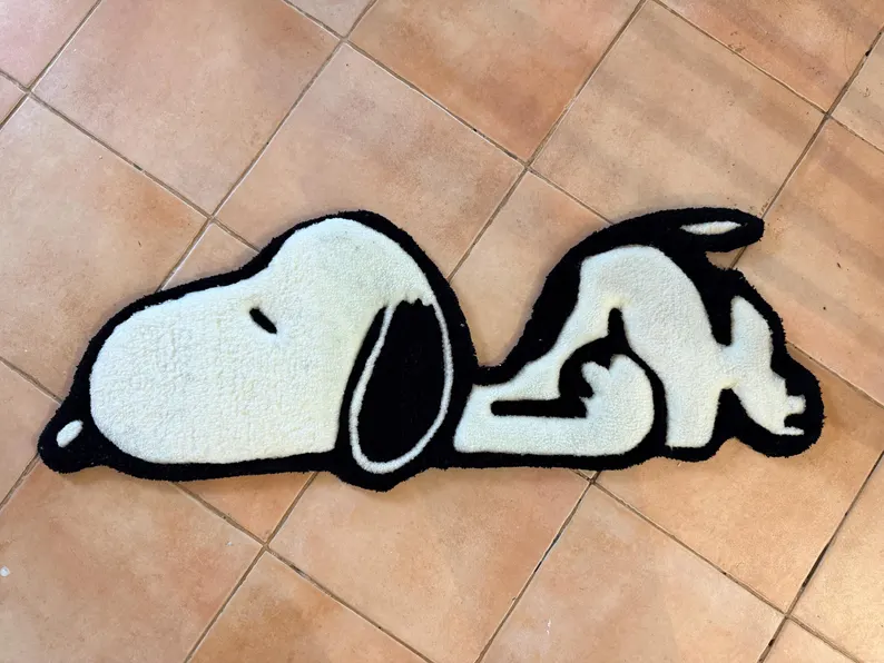 Tapis touffeté main — Chien couché noir & blanc | 85 × 30 cm